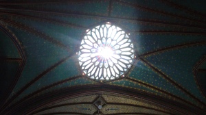 Stained glass window in the ceiling of the Basilica. Glows like a jewel.