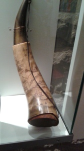 A carved 17th century powder horn, at the Center for History.